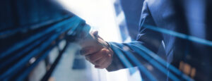 A client and a medical real estate broker from ASC Realty Advisors shaking hands